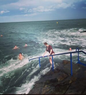 Christina Hendricks Instagram - Those of you who know me well, know I have a fear of the ocean. But bigger than that fear, is the fear of not doing something extraordinary because I’m too scared. So, I decided I would go to the 40 ft. In Dublin and jump into the Irish Sea. But before I could take my own steps, the ocean, in one dramatic wave , grabbed me from this rock and through me under, scraping my leg, plunging me under water with a mouth full of salt water as I was gasping for breath and then pummeling me over and over again with waves that made it almost impossible to swim back to land. But I did it. And it was exhilarating. I survived. And I might even do it again. But better planning next time…. I’m proud of myself. #40ft #dublin #irishsea