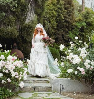 Christina Hendricks Instagram - My mother has Alzheimer’s and was not able to come to New Orleans for our wedding, so we brought the wedding to her yesterday in our backyard. My mother has always been my best friend and there was no way we weren’t going to share our love and celebrate with the biggest supporter and cheerleader in my life. When you are living so in the moment, so in the present, it is so important to have beauty and love and happiness around you. This time we had flower girls and dogs and more wonderful friends join us. @garbage surprised us with a Scottish wedding twist to this ceremony and it was another perfect day. @gillyflowersla made beautiful arrangements inspired by our New Orleans wedding and who wouldn’t want to wear their wedding dress twice!!! @katyakatyalondon @clairepettibone #alzheimers
