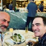 Christopher Meloni Instagram - Summer: Play. Friends. Dogs helping clean up after…slow cooked ribs. Garden tomatoes