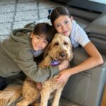 Cindy Sirinya Bishop Instagram – Together again with our Melbourne fam bam! We finally made it over to your side of the pond. All settled in, cozy and looking forward to making some lovely memories. ❤️ 

#melbourne #familytrip #buddy #labradoodle #homesweethome