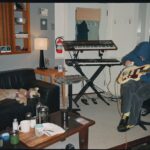 Clairo Instagram - Jack writing guitar parts for Zinnias and Joanie not giving a shit
