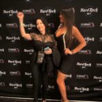Claudia Romani Instagram - So much fun to attend the Fists of Fury event at the @hardrockholly !!! Thank you @lisasilva2546 and Stephen for having us and all the help to the 🐈 🐈‍⬛, thank you @christianthun_official for a great show and for supporting our Non Profit @helpmiamicats thank you @inga.bespalovaite and Cinghis for the ton of work you put into supporting the community cats … Thank you my love @chrisvehovec for keeping up with the hectic cat rescuing lifestyle… Thank you @dionatelier for the beautiful custom fitted dress … and thanks to all the other lovely humans involved in supporting Miami community cats … please check out @helpmiamicats and be part of this mission … !!!!