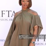 Corinna Brown Instagram - thank you @bafta x @lancomeofficial for having me💋 congrats to all the winners and nominees 🤩✨ 🧖🏾‍♀️: @michaellabolder 💄 :@joyadenuga x @lancomeofficial 🧑🏾‍🦰: @rendaattia 👗 : @tallermarmo 💼 : @longchamp 📸: @byholliem