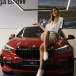 Cristinini Instagram - ¡¡ MI NUEVO COCHE !! 🥰🚗 Ya sabéis que llevo trabjando con BMW España 1 añito y pico y estoy súper feliz de formar parte de esta familia tan bonita @bmwespana Este año voy a llevar un BMW Serie 1 en rojo PRECIOSO el nuevo modelo pa estrenarlo 😊. Os iré subiendo más fotitos para que veáis como es. Este es del día en el que me lo dieron. ¿Qué os parece? :D