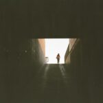 Dafne Keen Instagram - LA & NYC recap: tree in bloom, the goodest boy waiting in a car, skyscrapers, wall with shadows, traffic view from my flat, woman walking through a tunnel, a shop downtown, ash singing her heart out, Mandos hair after we took her braids out