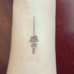 Dalila Bela Instagram - Thank you so much @antstattoo._.leo for the awesome tattoo!!! And thank you @antstattoo for having me!! The tattoo I got is of an unalome! It’s a Buddhist/spiritual symbol that represents the path that we all travel over the course of our lives. Our journey can be convoluted, but it will eventually end in a straight path, therefore symbolizing enlightenment and mental freedom!! I’m in love with how it came out!! #covidsafe #tattoo