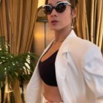 Dania Ramírez Instagram – Doctoring up this meeting… #beastmode #fashion #namaste 
Suit @ronnykobo 
Shoes @prada 
#VintageSunglasses
Styled by @galaxiab