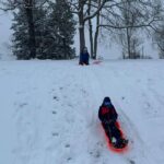 Danica McKellar Instagram - How is this our neighborhood?? 😁 Speaking as a California lifer until recently, this is surreal. We happened to be out of town last year when it snowed, so this was a new experience for sure! ☃️❄️ Such a fun time frolicking and sledding today - no "great pics" - wasn't that kind of day - but ah... #corememories made. 🥰❤️ (That's me in the red pants!) #snowday ❄️