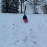Danica McKellar Instagram - How is this our neighborhood?? 😁 Speaking as a California lifer until recently, this is surreal. We happened to be out of town last year when it snowed, so this was a new experience for sure! ☃️❄️ Such a fun time frolicking and sledding today - no "great pics" - wasn't that kind of day - but ah... #corememories made. 🥰❤️ (That's me in the red pants!) #snowday ❄️