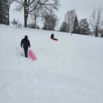 Danica McKellar Instagram - How is this our neighborhood?? 😁 Speaking as a California lifer until recently, this is surreal. We happened to be out of town last year when it snowed, so this was a new experience for sure! ☃️❄️ Such a fun time frolicking and sledding today - no "great pics" - wasn't that kind of day - but ah... #corememories made. 🥰❤️ (That's me in the red pants!) #snowday ❄️