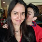 Danica McKellar Instagram - No makeup, no filter, just standing in front of a window taking a birthday selfie for you... and getting the best "interruption" ever. 🥰 #ThisIs49 #ilovebeingamommy . . Happy New Year, everyone!! Let's make it a year of renewed commitment to taking care of ourselves - lots of water, healthy food, moderate exercise - nothing crazy, just all the things we know are good to do. Because you know what? When we take care of our bodies, our bodies take care of us - including our mood! It's a great investment in ourselves - and you are worth the effort!! 🤗 (I'll be doing more yoga and stretching this year - it feels SOOO good and it so important for our bodies to function properly - link in my bio for my yoga DVD, "Daily Dose of Dharma." ❤️) . . On the spiritual side of things, continuing my faith journey, this year I'll be reading the Bible all the way through for the second time, using @thebiblerecap - it's not too late to join me, for anyone who's interested. 🙏 . . Sending you all the love in the world - Happy New Year! 🌟🎉