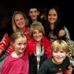 Danica McKellar Instagram - Happy New Year!! 🎉🌟 Feeling blessed to have spent it with family... in addition to my husband & son, my sister Crystal (yes she played Becky Slater on The Wonder Years 😁), both my brothers, my parents and also my niece & nephew. 🥰 . . Took some group shots... somehow my dad kept sinking into the chair and looking awkward, so we had some fun with that one. 😅 . . Sending love to you all for the new year ahead!! 🌟🎉 #2024