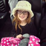 Danielle Busby Instagram - Yall! Nothing is cuter than my little Hazel Bazel 🥰 She loves her some bucket hats! #travelwardrobe #itsabuzzworld