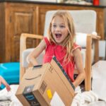 Danielle Busby Instagram - Scrolling through pics and can’t help but smile at Riley. Her excitement opening up every gift was priceless…even opening up her pair of crocs she picked out 🤣 #christmas #itsabuzzworld #outdaughtered