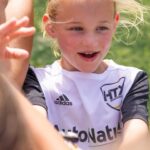 Danielle Busby Instagram - So proud of my little RI Ri! The look on her face says it all! She scored her first goal of the season. She usually doesn’t get many opportunities to shoot on goal because she primarily plays defense. They moved her up in the second half today and she took advantage of it! @htxsoccer #firstgoal #soccer #outdaughtered #itsabuzzworld.