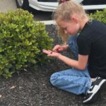 Danielle Busby Instagram - Our little bug lover Riley Paige, she can spot them anywhere!! #itsabuzzworld #outdaughtered