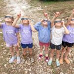 Danielle Busby Instagram - What and epic 9th Birthday to remember! Quints turned 9 on Monday, same day the solar eclipse happened. It really was an amazing experience to be out in the country with an open sky witnessing it go from daylight to, darkness, to day light all in 4 minutes! Core memory made this day! Happiest of birthdays to my Ava Lane, Olivia Marie, Hazel Grace, Riley Paige and Parker Kate. You all are a little miracle and I couldn’t imagine life without each of you. I love you, and you, and you, and you and you!! Can’t wait to celebrate yall at your party! 🥰🎂 #happybirthday #quintuplets #eclipse #itsabuzzworld #outdaughtered