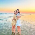 Danielle Busby Instagram – Night at the beach to celebrate our KB turning 13🥳 When you and your bestie have daughters 4 months apart, they are totally born with a besties already! Love the friendships BB & KB have been born into 😝 HAPPY BIRTHDAY Kennie Lane. We love you!! 
#bestie #friendship #itsabuzzworld