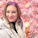Danielle Busby Instagram - I’m allllll about a theme when it comes to.. uhhhh, everything! 🤪 Todays theme is Floral AF (floral And Forty) ! First place we stopped had a floral wall and I got so excited! Perfect for todays theme 🌸 Cheers to Meeeeee 🥂 #birthdaytrip #itsabuzzworld