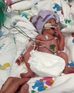 Danielle Busby Instagram - My Quintuplet, Baby D, Riley Paige 💜 You, my darling, are a baby in my pregnancy that I will never forget. You were a constant pain (like physical pain) in my side 🤰🤪 constantly kicking, pushing, punching all the things you could to try to make room, but there was never any room to be found… especially when there are five babies in that one belly. You sat on top of Olivia in the womb and I’m pretty sure this is why you and Olivia have that ‘rivalry sister love’ for each other…🤣 she felt the brunt of all these kicks and punches too.  Riley Paige, you are one true blessing to this world and into MY life.  Your life story, at being only 3 days old, allowed me to see God, understand God and actually FEEL God in a way I never had before. You have taught me so much… so much! patience & grace I didn’t know I could ever have.  You are so headstrong, determined and so incredibly smart. You aren’t afraid of much, know what you want, and you strive for excellence. You are witty just like your daddy and a leader just like your mommy! You love snacks more than anything in life, and your love for creatures & animals is so thrilling to watch. I can not wait to see the BIG things you conquer in this world Riley Paige! Mommy will always be here to cheer you on!!! You amaze me every day and I’m so thankful that God gave me you.  Celebrating you this month as a #nicugraduate 8 years ago 💚 Thank you Lord for this precious child 💚 #nicuawarenessmonth💚 #nicubaby #itsabuzzworld #outdaughtered #quintuplets