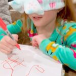Danielle Busby Instagram - Who won the Blindfolded drawing challenge? @dbusby had a game night while i was away in Vegas. Watch the full video on our itsabuzzworld YouTube. #blindfoldeddrawingchallenge #blindfolded #familygamenight #whowon #itsabuzzworld #outdaughtered