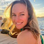Danielle Savre Instagram - I’ve got sunshine on my back & a smile on my face ☀️⛵️ #2023 #newyear