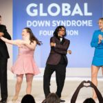 Danielle Savre Instagram - It was an absolute honor to walk down the runway in style with Hussein at the @globaldownsyndrome #bebeautifulbeyourselffashionshow this last weekend!! I’m thankful to have been part of such a magical night to fight for life changing #downsyndrome research and medical care and to celebrate the Down syndrome community. Thank you @caterinascorsone for the invite and introduction! 💙