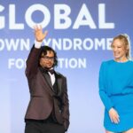 Danielle Savre Instagram - It was an absolute honor to walk down the runway in style with Hussein at the @globaldownsyndrome #bebeautifulbeyourselffashionshow this last weekend!! I’m thankful to have been part of such a magical night to fight for life changing #downsyndrome research and medical care and to celebrate the Down syndrome community. Thank you @caterinascorsone for the invite and introduction! 💙