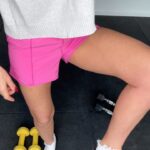 Davina McCall Instagram - What on earth is going on here? Why am I wearing a heel and workout shorts? Basically slightly strained my Achilles, and it’s more comfortable in heels.😂😂 was feeling a bit sore after strength training so I decided Id do yoga with Roisin from @ownyourgoalsdavina I did the check. Gonna talk to Roisin on Wednesday live at five. To find out why Yoga is good for us. Why she started doing it, where she trained, and find out a bit more about her as a person.❤️❤️❤️#workout #ad