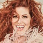 Debra Messing Instagram - As it was #NATIONALHAIRDAY yesterday, I thought I’d take a walk down memory lane. I have always loved to have my hair styled by professionals. It makes me feel like it transforms me into some other persona. I’ve had every color red in the color spectrum, every type of curl. My hair has gone through periods of excessive manipulation and I have used so many great products to help keep the frizz at bay and to keep it healthy. Happy Hair Day! Have fun with yours today! Which style do you like best? #haircolor #hairstyle #haircaretips