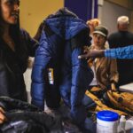 Debra Messing Instagram - I know we all feel helpless and are hurting because of all the discord in the world. I was feeling overwhelmed with sadness and not able to simply function. I am grateful to @elsamariecollins and @thisisabouthumanity for inviting me to help pass out 700 coats to newly arrived asylum seekers In New York with @americaferrera and @busyphilipps and many others. For anyone who is struggling right now, you might want to consider volunteering, even for just a few hours, in your local communities. There are so many organizations that can use a helping hand. Thank you to @thisisabouthumanity for bringing community together in service of others and to the @nycemergencymanagement @zachiscol for coordinating the visit and for all the important work you are doing. You bring light and hope.