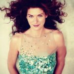 Debra Messing Instagram - As it was #NATIONALHAIRDAY yesterday, I thought I’d take a walk down memory lane. I have always loved to have my hair styled by professionals. It makes me feel like it transforms me into some other persona. I’ve had every color red in the color spectrum, every type of curl. My hair has gone through periods of excessive manipulation and I have used so many great products to help keep the frizz at bay and to keep it healthy. Happy Hair Day! Have fun with yours today! Which style do you like best? #haircolor #hairstyle #haircaretips