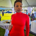 Demetria McKinney Instagram – Attended Polo Classic Fashion Show! Fall colors while attending. I had so much fun 🤗
Jumpsuit by: @mariaharperdesigns 
Shot by: @cviro4real 

#sisterlocs #fashion #orange #outfit #fall