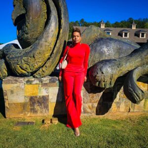 Demetria McKinney Instagram - Attended Polo Classic Fashion Show! Fall colors while attending. I had so much fun 🤗
Jumpsuit by: @mariaharperdesigns 
Shot by: @cviro4real 

#sisterlocs #fashion #orange #outfit #fall