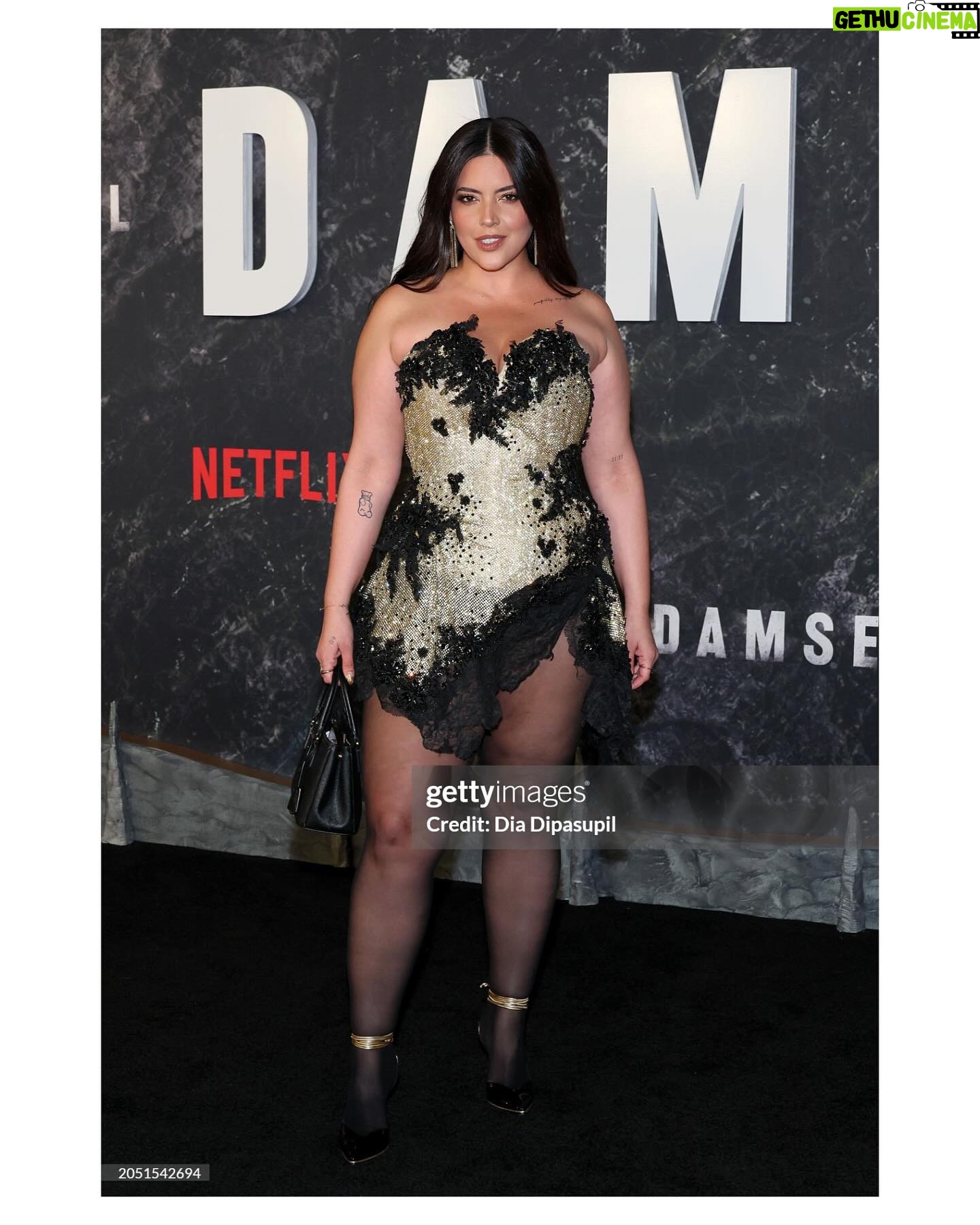 Denise Bidot Instagram - A proper #tbt to last weeks magical world premiere for @netflix new film #damsel. The movie is SO good (I live for a good twist) and @milliebobbybrown killed it. Didn’t even realize how perfect the occasion would be, then, mini me, @jjossymarie got to have her first solo red carpet moment, at the Plaza nonetheless (such a vibe, so I had to add the video) lol 😅🤪 Special thanks to @theblondsny for my incredible dress, which fyi was straight from the runway ( I know because I wore it 😜). @phillipeblond @davidblond the craftsmanship behind your work is truly next level. I felt like the ultimate warrior princess. Another huge thanks to @brian_atwood @zaksrodriguez for gifting me the most beautiful heels from @il.fratellino which I’ll never stop wearing, because, well, they are perfect. To the team over at @houseof.nyc you always have the best brands and are beyond generous with me, always allowing me to pull and showing me love . Thank you for not only letting me wear the beautiful jewelry by @senianewyork but for also getting Joselyn fly for the night , it meant the world to me. Then there’s my girl @suave_wig who brought my hair to life and my forever boo @nails_byely who killed it on mine and Joselyn’s nails. (If you are in nyc and need nails or hair, they are the ones!) And last but not least thank you to @florencebymills @netflix for inviting us and giving us a night for the books 💜✨ I know this probably feels like a lengthy caption but I’ve been truly blessed to have amazing people in my life and I wanted to take a second to really thank them. I never want to take a single moment for granted. Besitos everyone 😘 Red carpet photos and videos courtesy of @gettyimages Oh and Damsel officially comes out tomorrow on Netflix, go watch and let me know your thoughts 🫶🏼✨