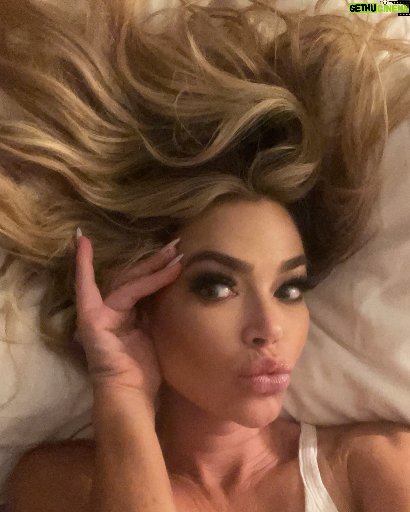 Denise Richards Instagram - I know I shouldn’t go to bed without washing my makeup off …. But.. I love it so much. Leaving lashes on too. Sorry @drlancerrx sometimes we have to just enjoy the glam💛✨💫