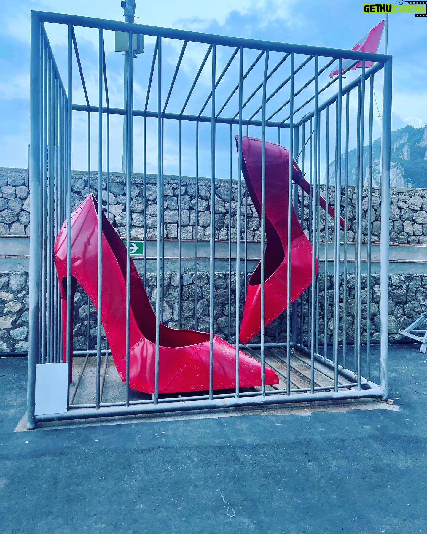 Denise Richards Instagram - Cutest display .. 👠👠these giant red shoes at the dock in #capri I want them!