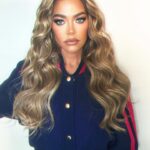 Denise Richards Instagram - Shooting something exciting today! Can you guess what it is? MUA @julzhopemua Hair using @hiddencrownhair color sunset 👗 @louisvuitton