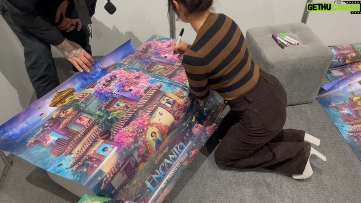 Diane Guerrero Instagram - What a time! Gracias Lima, Peru por tu apoyo y amor 🧡 I loved signing these gorgeous @encantomovie posters honoring this incredible team’s work! 😌