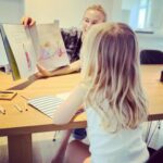 Diane Kruger Instagram - Reading „A Name from the Sky“ to my daughter for the first time ❤️❤️❤️❤️ Semi successful hahaha, she didn’t like the red shoes she is wearing in the end 💆‍♀️ OCT 25 in the US and GERMANY (Dein Name)