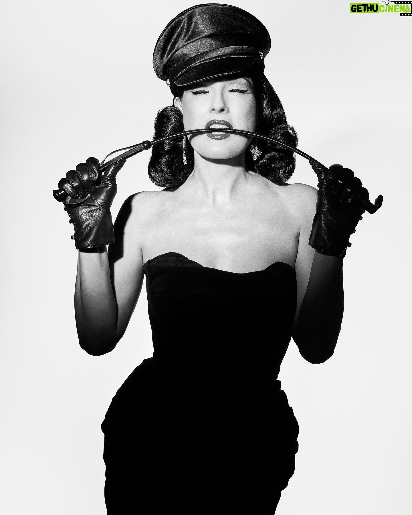 Dita Von Teese Instagram - It’s nice to be on her naughty list. Wearing the FEMME DE TÊTE satin fetish cap. Image by @travis_shinn