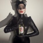 Dita Von Teese Instagram - Presenting @sweetgwendolinefrenchgin ✨🍸✨ Distilled in France and bottled in New Orleans, it’s infused with 7 botanicals, including fig, and finished with #French white wine. #SweetGwendoline #gin is available for online purchase in 28 U.S. states the District of Columbia: teese.us/sweetg 📷 @sanchezzalba Dress @lenahoschek #Glamonatrix veil @hood_london