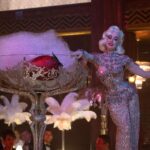 Dita Von Teese Instagram – A still photo from the set of @dontworrydarling and today’s @voguemagazine piece: 
https://www.vogue.com/article/dita-von-teese-dont-worry-darling-cameo-interview/amp 
See it live, only on the Glamonatrix tour @ticketmaster ✨🍓🥂

#dontworrydarling #Glamonatrix #swarovski @catherinedlish