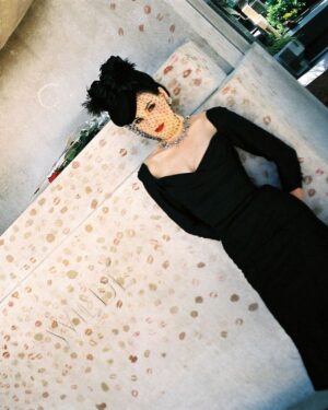 Dita Von Teese Instagram - Flashback to the mid-90s in Paris at #perelachaise with  the monument of #oscarwilde before it was protected by glass. I personally did not add a lipstick print, as I had just visited #victornoir 🖤 More of these photos, plus video are up for subscribers, link in bio. 

📷 @christophe_mourthe