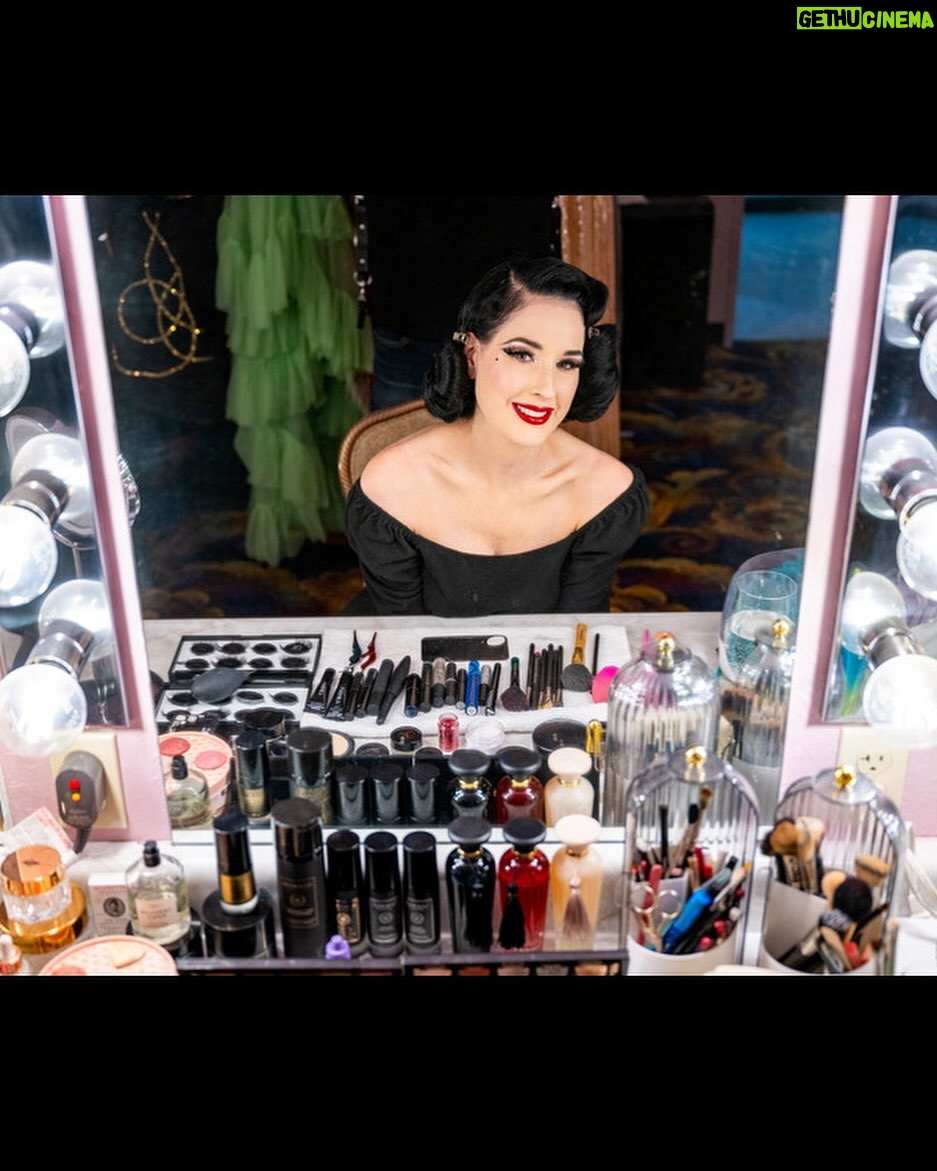Dita Von Teese Instagram - Ready to make an entrance ✨ WWD got ready with @ditavonteese in Las Vegas! Photo 1: On the showgirl disc above the audience. Vintage Jubilee! showgirl headdress by Pete Menefee, costume by Michael Schmidt utilizing Swarovski Crystal. Photo 2: In my quick change dressing room, getting set to start the show. Photo 3: In Jenny Packham, posing with the car I drive out onstage… and sometimes down the Las Vegas Strip! Photo 4: Wearing Jenny Packham and posing with the Bob Mackie finale “Jewels” costumes Photo 5: My vanity area in my dressing room backstage at the legendary Jubilee Theater, which housed the last great Las Vegas showgirl revue. Report: @knowandtell 📸: @bfreedphoto