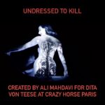 Dita Von Teese Instagram - A bit of the light projection mapping striptease @alimahdaviparis created for me at @crazyhorseparis_official in 2016. “Undress to Kill, the last act I created at the Crazy Horse Paris for my ultimate muse, Dita Von Teese, is perhaps one of the most beautiful things I’ve ever done.” In these words Ali Mahdavi, contemporary and polymorphous artistic figure, describes this aesthetically remarkable tableau. By displaying the genius of augmented reality on stage, he was able to transform his ideas into living and otherworldly costumes, thereby giving the Crazy Horse its first virtual striptease in the world! With her feline steps and suggestive poses, Dita gets dressed and undressed by light, beautiful haute couture by Stefano Canulli. The magic works thanks to her on-stage presence… and precision. This avant gardist act was initially imagined by Ali Mahdavi for the majestic Dita Von Teese, uncontested icon of burlesque, for her exclusive show in 2016 on the Crazy Horse stage, “Dita’s Crazy Show”. Ever since, the most courageous of the Crazy Girls take up this dual challenge of acting and dexterity, personifying a charismatic and voluptuous woman who will beguile you with her illusions.