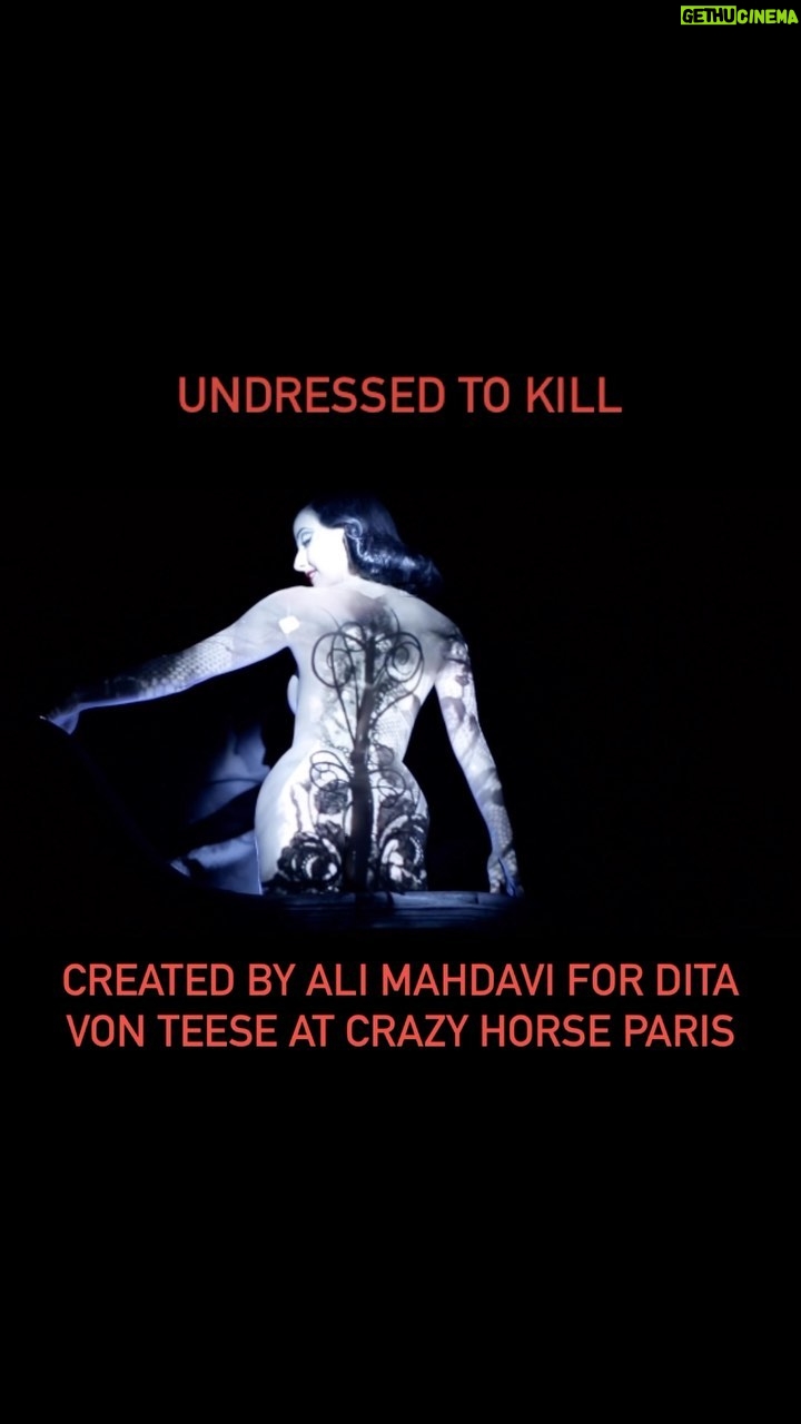 Dita Von Teese Instagram - A bit of the light projection mapping striptease @alimahdaviparis created for me at @crazyhorseparis_official in 2016. “Undress to Kill, the last act I created at the Crazy Horse Paris for my ultimate muse, Dita Von Teese, is perhaps one of the most beautiful things I’ve ever done.” In these words Ali Mahdavi, contemporary and polymorphous artistic figure, describes this aesthetically remarkable tableau. By displaying the genius of augmented reality on stage, he was able to transform his ideas into living and otherworldly costumes, thereby giving the Crazy Horse its first virtual striptease in the world! With her feline steps and suggestive poses, Dita gets dressed and undressed by light, beautiful haute couture by Stefano Canulli. The magic works thanks to her on-stage presence… and precision. This avant gardist act was initially imagined by Ali Mahdavi for the majestic Dita Von Teese, uncontested icon of burlesque, for her exclusive show in 2016 on the Crazy Horse stage, “Dita’s Crazy Show”. Ever since, the most courageous of the Crazy Girls take up this dual challenge of acting and dexterity, personifying a charismatic and voluptuous woman who will beguile you with her illusions.