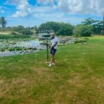 Dominique Jackson Instagram - I will never understand it! When I see signs like that, I get as far away from the space as possible but Mr. adventure over here getting closer! #funtimes😎 #tobago #trinbagonian🇹🇹 #trinbago #caiman #businessandpleasure 😉😘🥰🥰