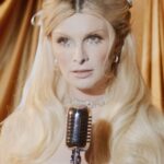 Dylan Mulvaney Instagram - Blue Christmas full video out now 💙🏳️‍⚧️ Director: @nicklaughs Gentleman caller: @kristoferthomas Director of photography: @markdsim Music production: @andrewbarretcox Editor: @hunterboone Hair: @whoiszenobia Makeup: @laurelcharleston Custom dresses: @chiquitettas @ryanseminara Filmed at @metropolitan_bk