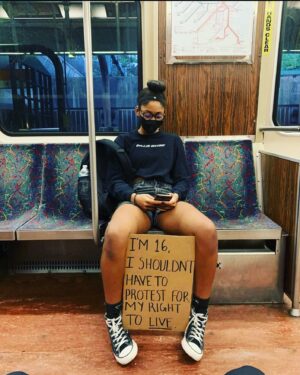 Eliza Dushku Instagram - My niece, 16 years old, took this pic of her friend as they headed out to Franklin Park last night to peacefully protest for BLM. Let it really sink in.

All were well aware of the covid & unknown risks “we wore masks, did our best to social distance, & it was really cool- they had hand sanitizer stations set up all around—& it was SO peaceful, Yaya” she told me.

Since then she has self-quarantined away from her family at home for the next number of days— but she’s clear in her message & determination: that this was worth it, that this was/is necessary~ “I am going to be on the right side of history when we look back at this time one day,” she told me unwaveringly. Proud of them, these kids have guts, heart, & brains. I have some hope knowing they’re our future.

#blacklivesmatter #solidarity #humanity #justice #peace